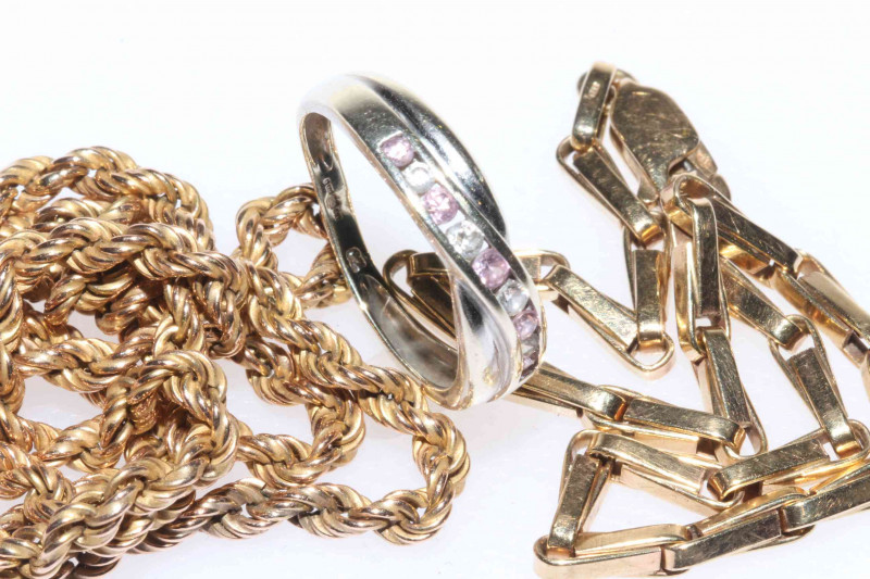9 carat gold necklace and bracelet and 9 carat white gold ring.