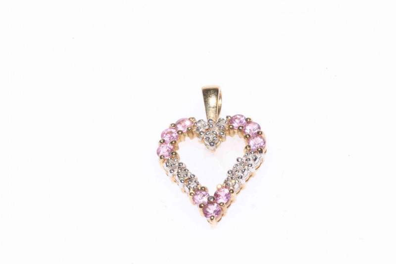 9 carat gold sapphire and diamond heart pendant.
