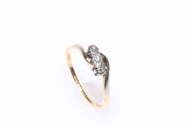 18 carat gold three stone diamond ring, size N.