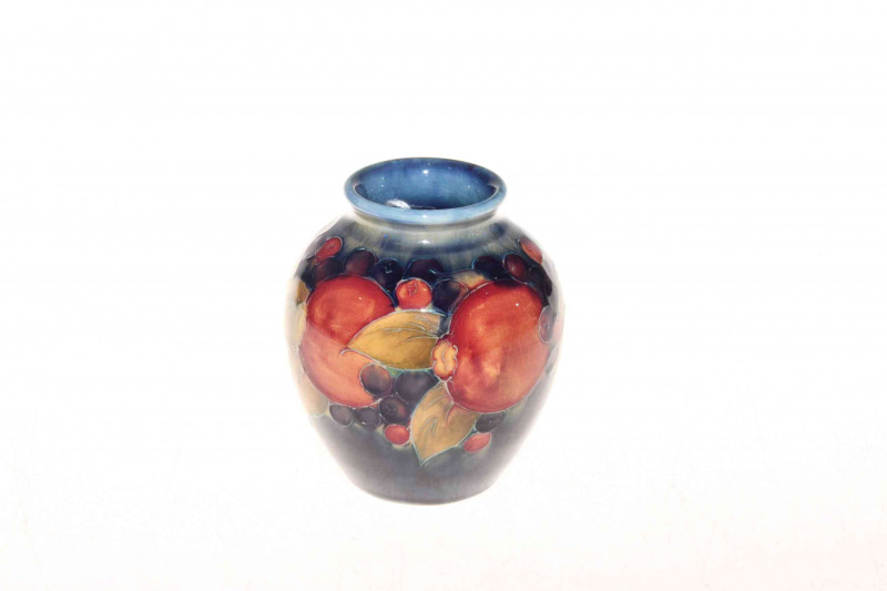 Moorcroft Pottery pomegranate vase, 13cm.