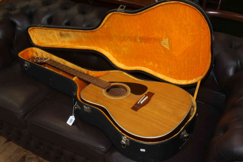 Yamaha FG-335 acoustic guitar and case.