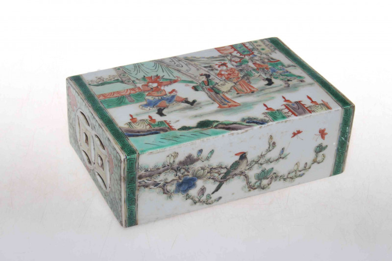 Chinese porcelain pillow, of rectangular form profusely painted with figures and birds on branches, 21cm across.