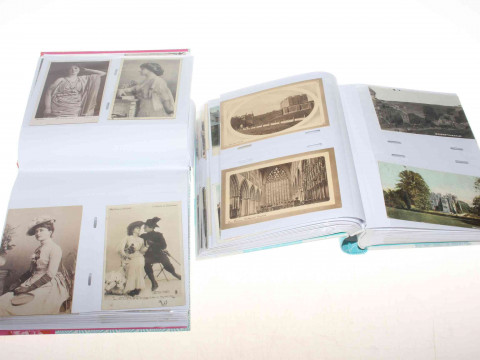Two albums of postcards including Sanger's Circus, Crown Hotel Middlesmoor,...