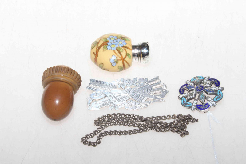 Silver topped scent bottle, treen acorn, two brooches and small chain (5).