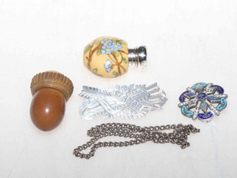 Silver topped scent bottle, treen acorn, two brooches and small chain...