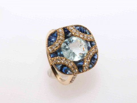 14 carat yellow gold aquamarine, sapphire and diamond ring featuring one...
