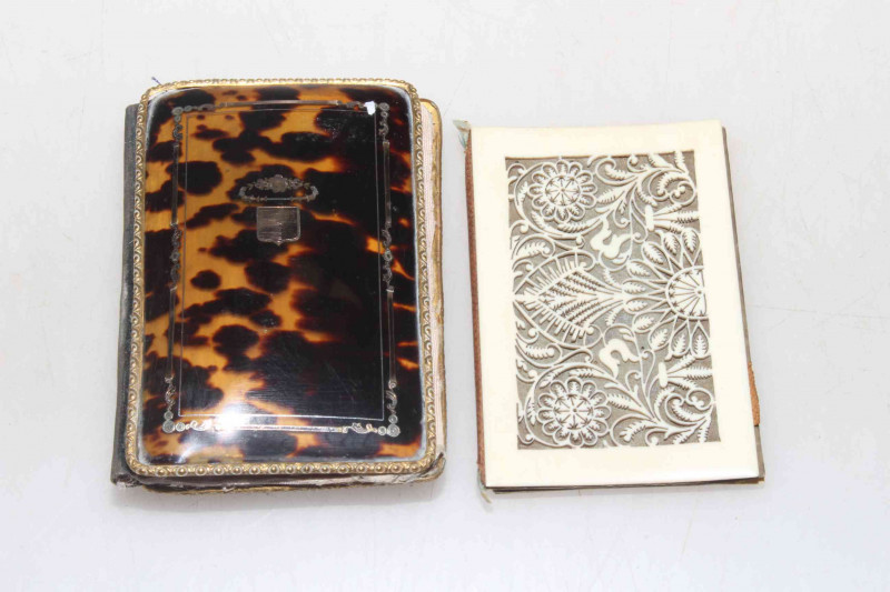 Gold inlaid tortoiseshell needle case and ivory case (2).