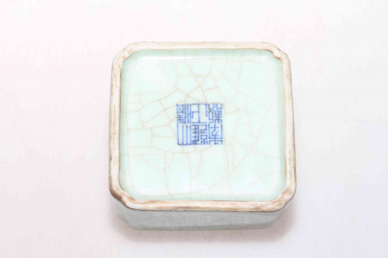 Chinese crackle glazed water pot with relief dragon and bat.