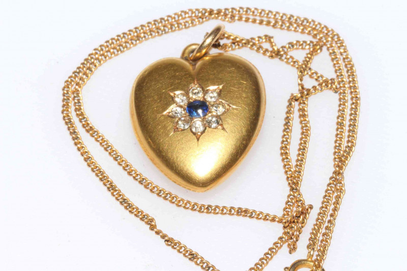 Victorian matt gold heart pendant set with sapphire and diamonds, with 9 carat gold chain.