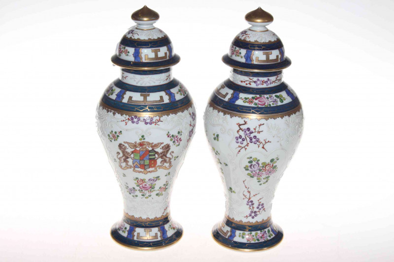 Pair Continental armorial vases and covers.