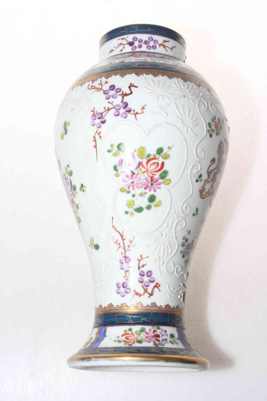 Pair Continental armorial vases and covers.
