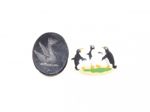 Rock crystal three penguin intaglio and an agate intaglio.