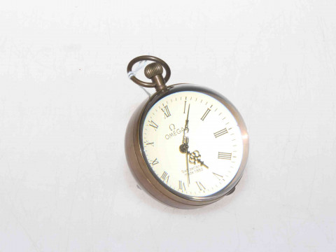 Spherical clock with ring handle.