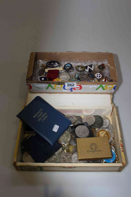 Collection of enamelled badges, and box with medallions, coins and badges.