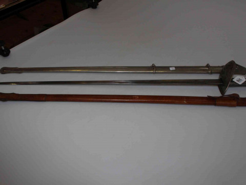 Victorian ceremonial sword and scabbard, the blade with engraved decoration...