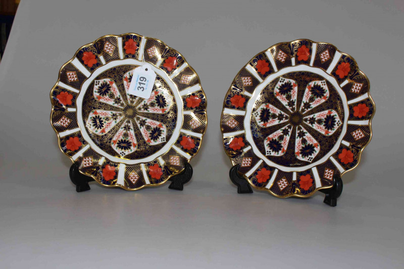 Pair Royal Crown Derby fluted Imari pattern plates, 22cm diameter.
