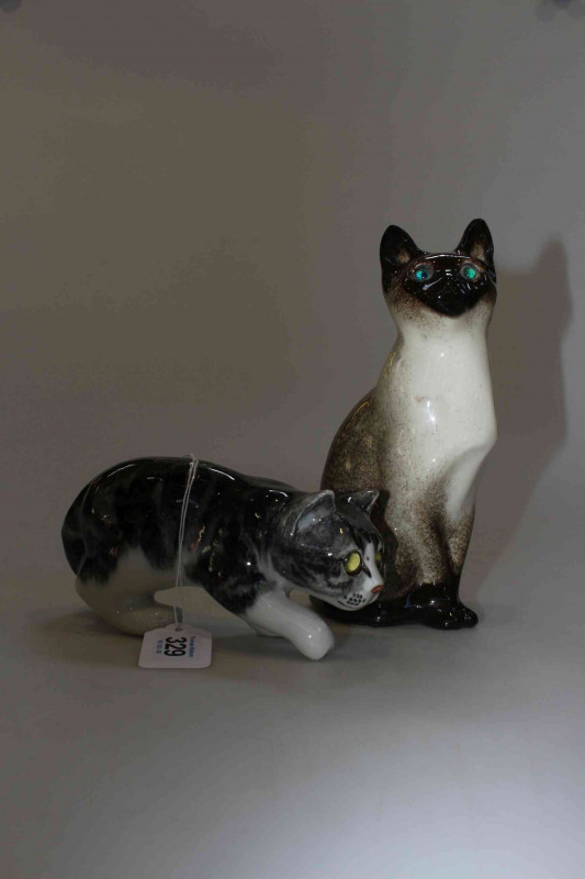 Two Winstanley Pottery Cats, size 2 including Siamese.