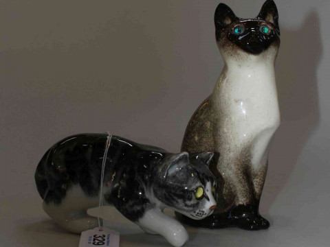 Two Winstanley Pottery Cats, size 2 including Siamese.