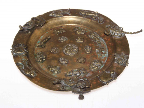 Chinese bronze plate with applied figures and animals, 23cm diameter.