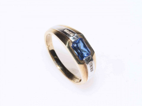 9 carat gold and sapphire ring, the rectangular sapphire flanked by rows...
