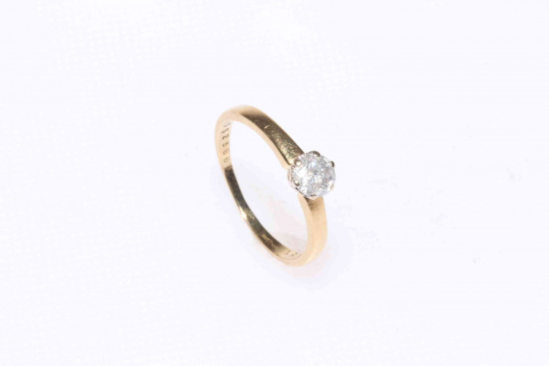 Solitaire diamond ring set in 18 carat gold, size K.