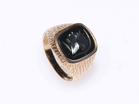 9 carat gold ring with haematite intaglio, size R.