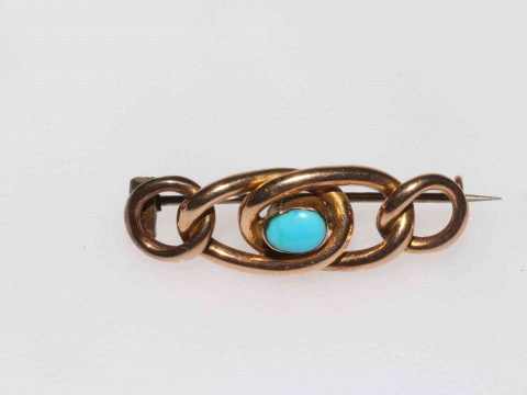 Edwardian 9 carat gold and turquoise set brooch.