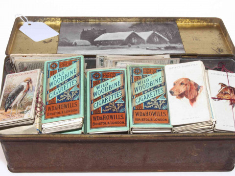 Tin of cigarette cards including Wills, Players, Ogdens, Churchman, Godfrey...