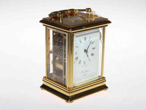 Gilt brass carriage clock, the striking movement signed St. James, London.