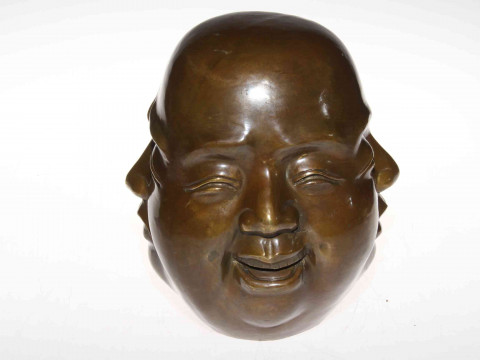 Four face Buddha sculpture.