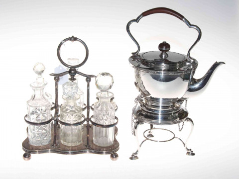 1920's silver plated spirit kettle and six bottle cruet (2).