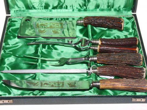German stainless steel carver and poultry serving set, boxed.