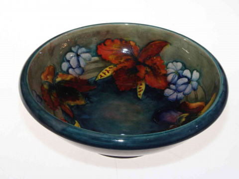 Moorcroft bowl with foliate decoration on blue/green shaded ground, painted...