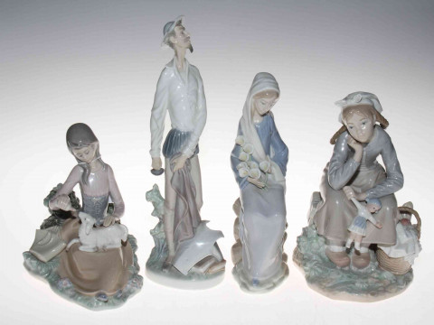 Collection of four Lladro figures.