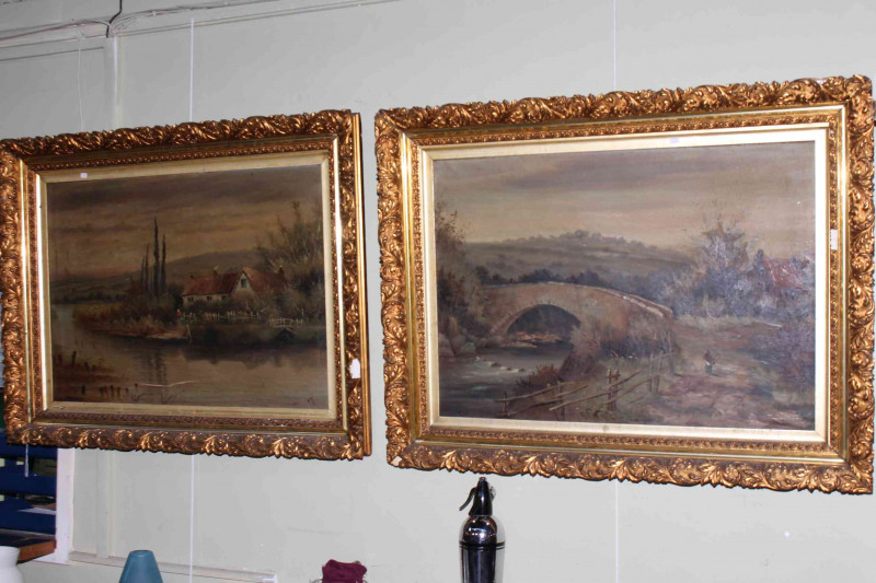 Pair Victorian gilt framed oils on canvas of lone figures in rural river scenes, overall 80cm by 105cm.
