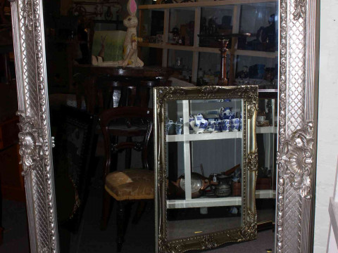 Large ornate silvered frame bevelled wall mirror, 183cm by 134cm overall.