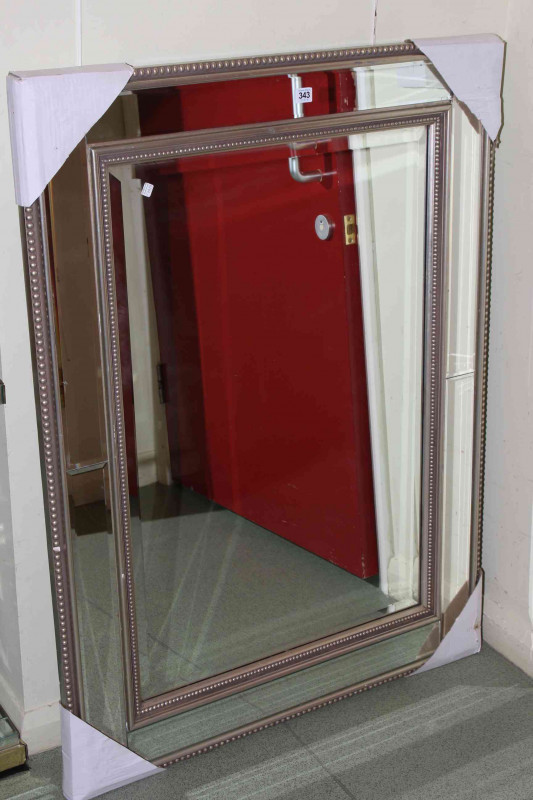 Rectangular silvered frame marginal wall mirror, 119cm by 87cm overall.