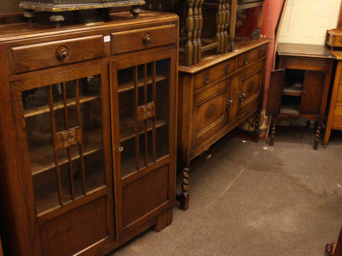 1930's oak mirror back sideboard, oak bookcase having two drawers above...