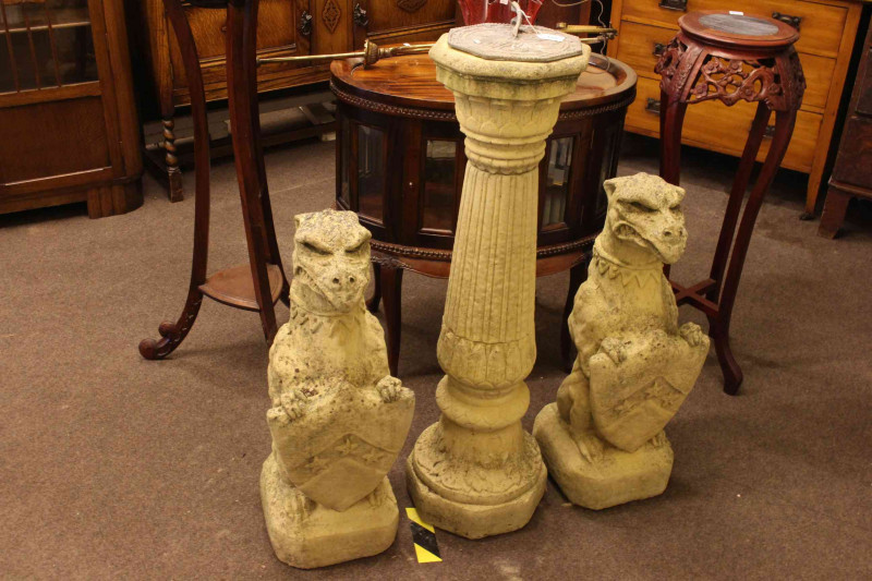 Pair concrete armorial garden griffins, 74cm tall and concrete pedestal with lead sundial (pedestal 101cm tall).