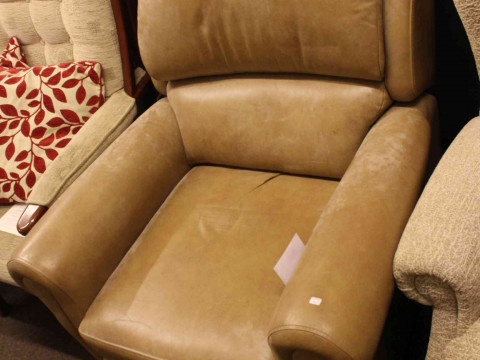 Sherborne light tan leather reclining chair.