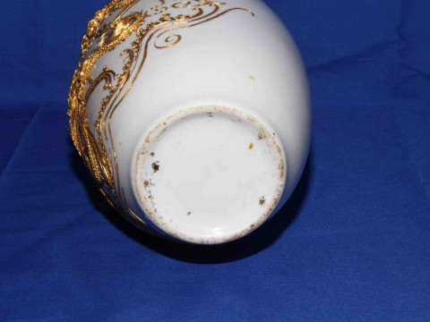 Pair Chinese vases having applied gilt decoration of pagoda and dragons on white ground, 30cm. thumbnail