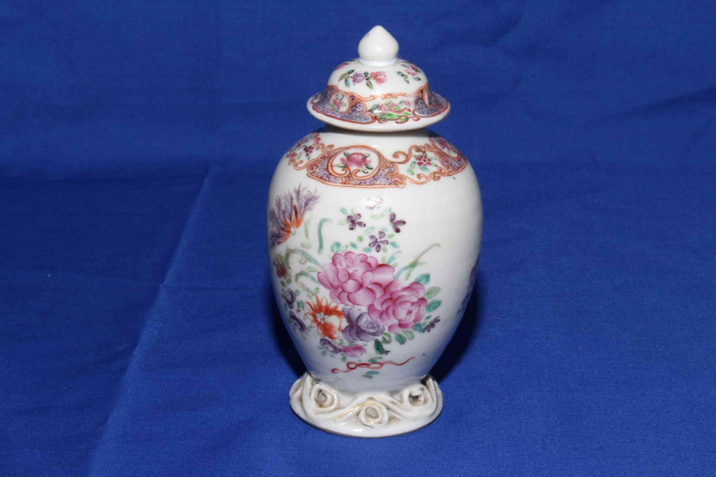 Chinese Chini Lung vase/tea canister, the body and cover painted with flowers and having scroll foot rim, 13.5cm.