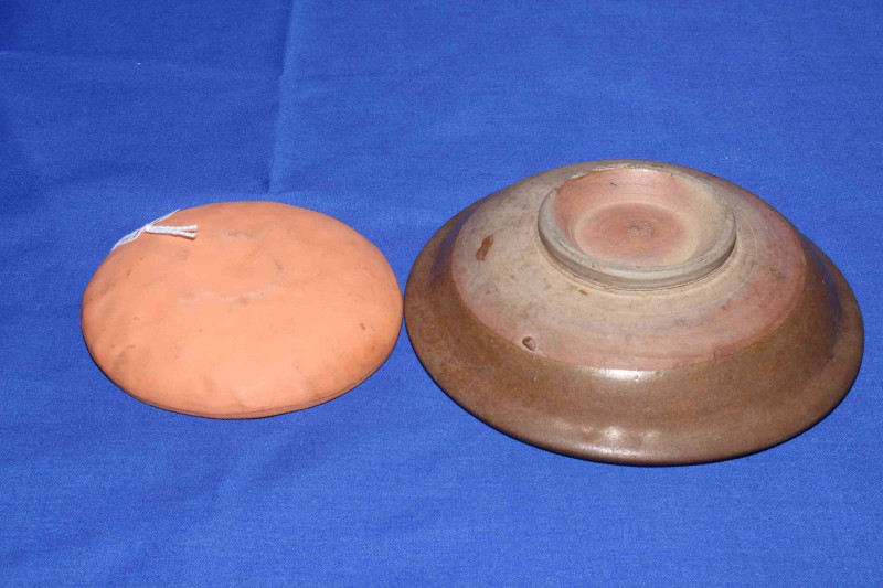 Two small Chinese pottery and terracotta shallow dishes.