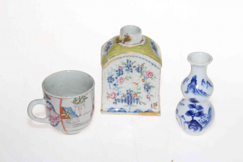 Collection of Chinese pieces comprising two prunus ginger jars, blue and white sauce boat, two jugs and vase, polychrome tea caddy and cup, pair cloisonne vases and two wood stands (12).
