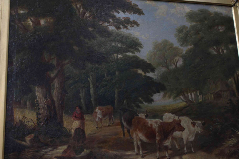 Two Victorian gilt framed oils on canvas depicting cattle in landscape and woodland, each approximately 70/75cm by 90cm.