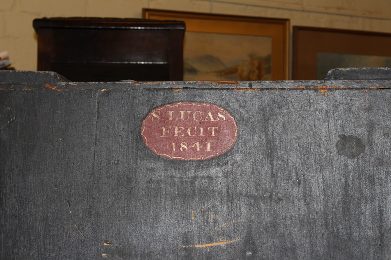 Oriental chinoiserie painted table cabinet having two doors enclosing two short and four long drawers, 56cm by 48cm.