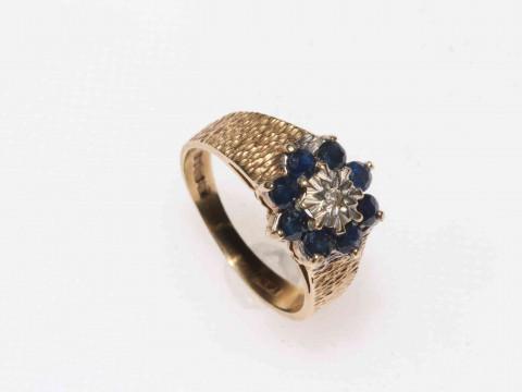 9 carat gold, sapphire and diamond ring.