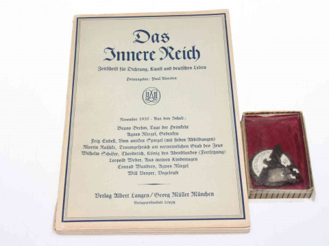 German militaire volume and KREISSIEGER 1942 badge (2).
