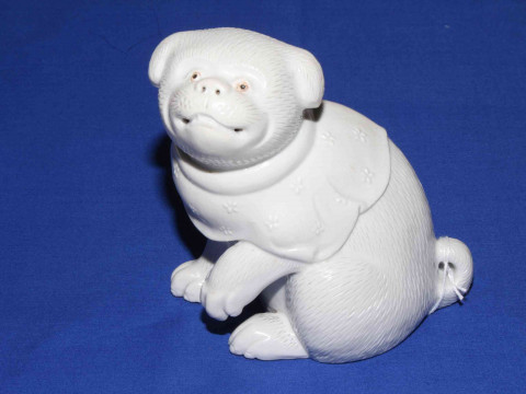 Japanese white glazed porcelain dog, 14cm.