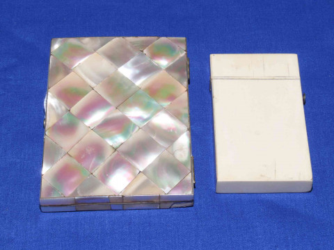 Victorian mother of pearl card and note case, and an ivory card case (2).